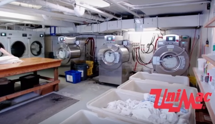 UniMac laundry equipment in hotel on-premises laundry room