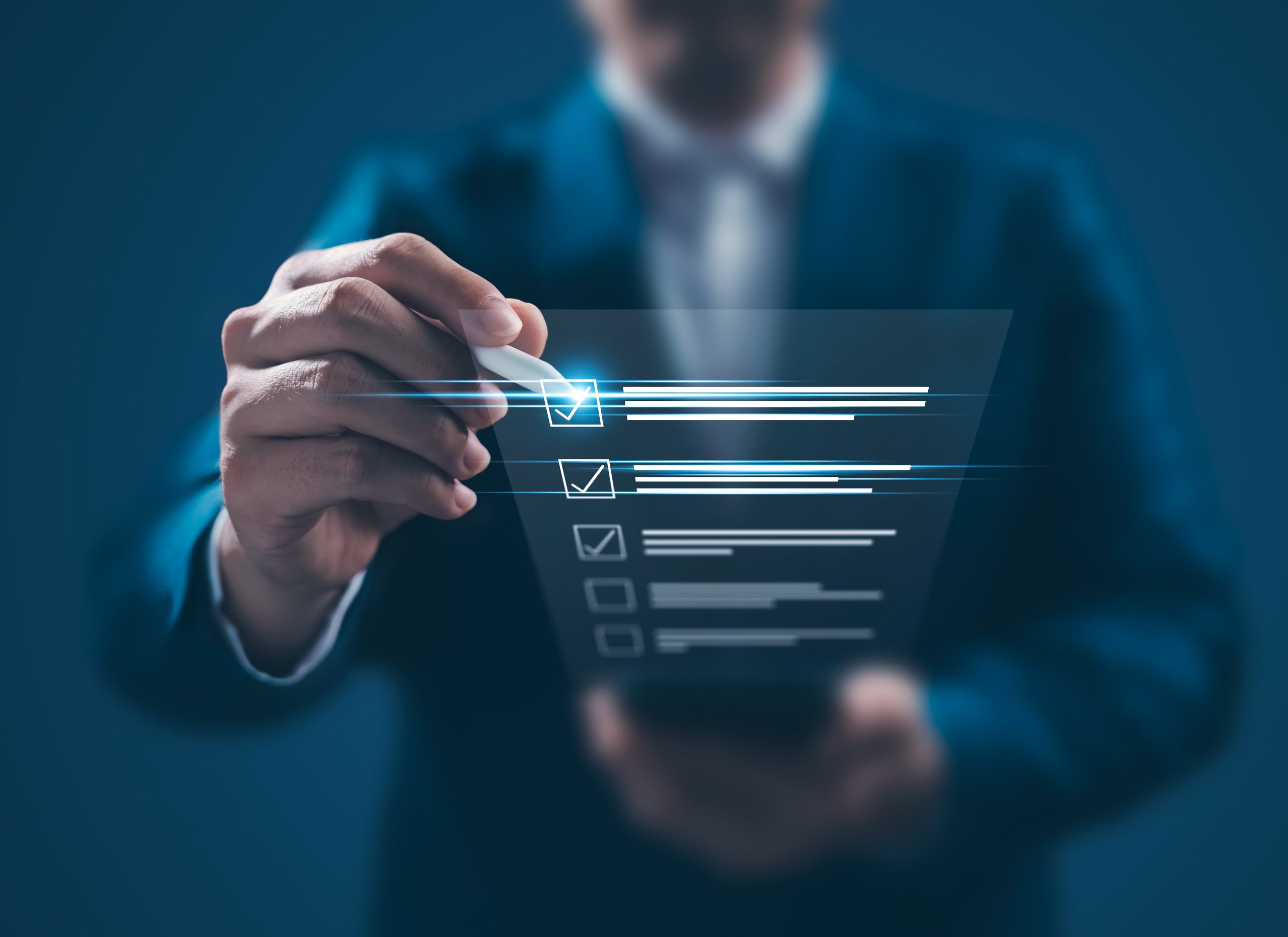 what-to-expect business man holding digital list